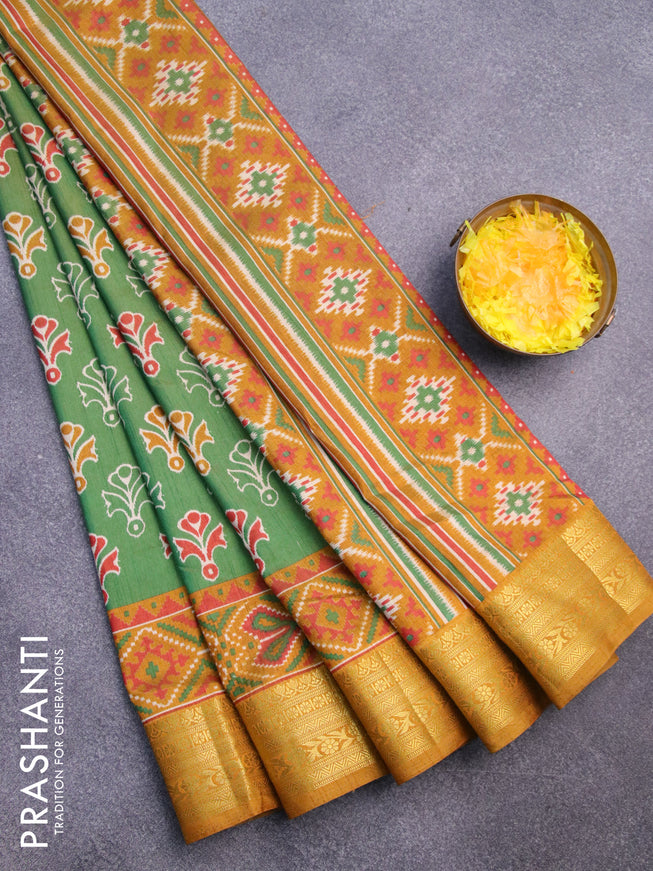 Semi tussar saree green and mustard shade with butta prints and zari woven border