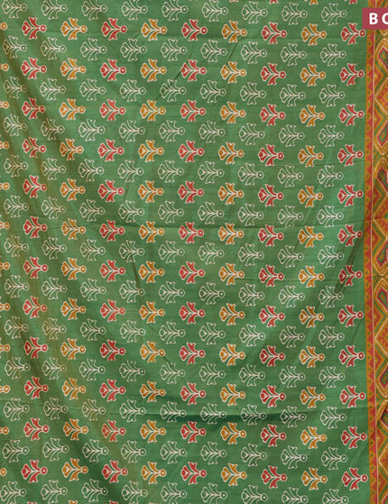 Semi tussar saree green and mustard shade with butta prints and zari woven border