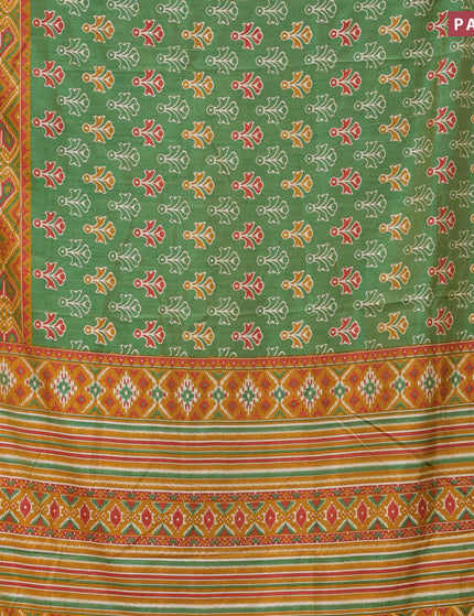 Semi tussar saree green and mustard shade with butta prints and zari woven border