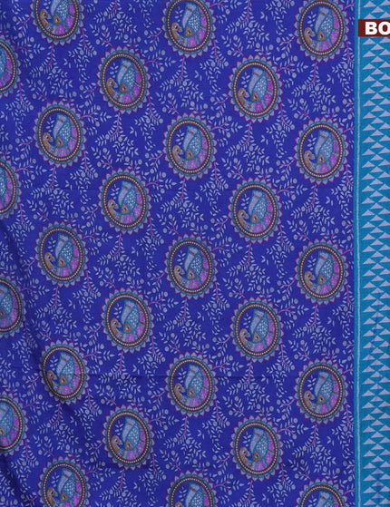 Semi tussar saree blue and teal blue with allover madhupani prints and zari woven border