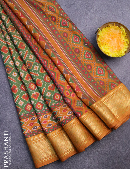 Semi tussar saree green and dark mustard with allover ikat prints and zari woven border