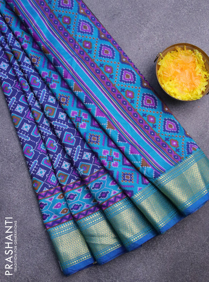 Semi tussar saree dark blue and teal blue with allover ikat prints and zari woven border