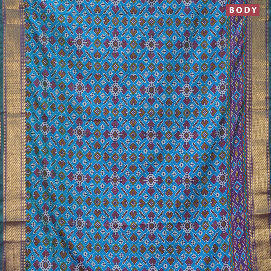 Semi tussar saree dual shade of teal blue and dual shade of violet with allover ikat prints and zari woven border