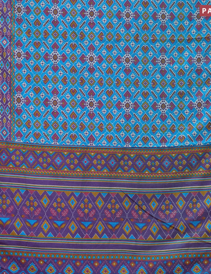 Semi tussar saree dual shade of teal blue and dual shade of violet with allover ikat prints and zari woven border