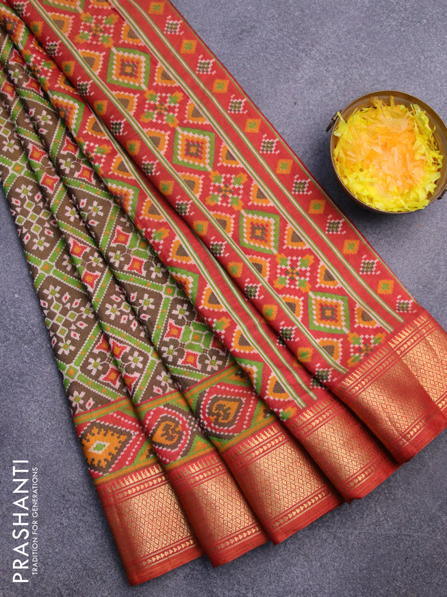 Semi tussar saree dark brown and rust shade with allover prints and zari woven border