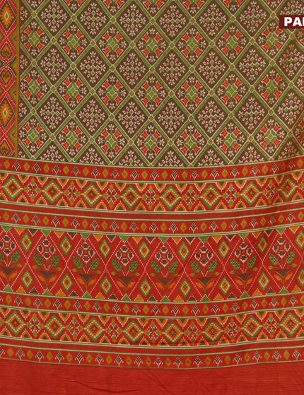 Semi tussar saree dark brown and rust shade with allover prints and zari woven border