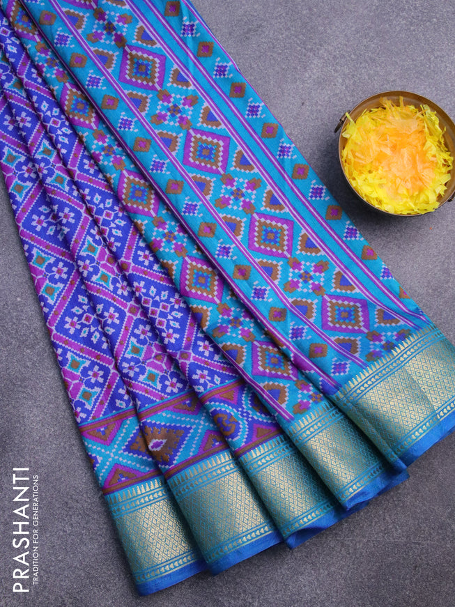 Semi tussar saree blue and dual shade of teal blue with allover prints and zari woven border