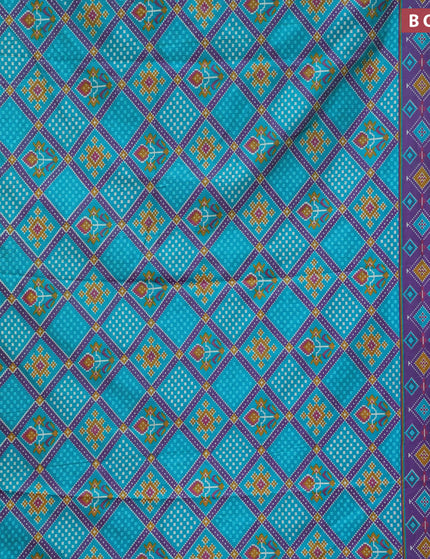 Semi tussar saree teal blue and dual shade of purple with allover ikat prints and zari woven border