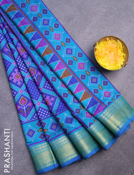 Semi tussar saree blue and cs blue with allover ikat prints and zari woven border