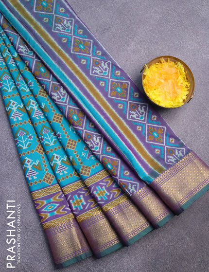 Semi tussar saree teal blue and dual shade of purple with allover ikat prints and zari woven border