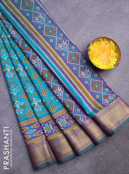 Semi tussar saree teal blue and dual shade of purple with allover ikat prints and zari woven border