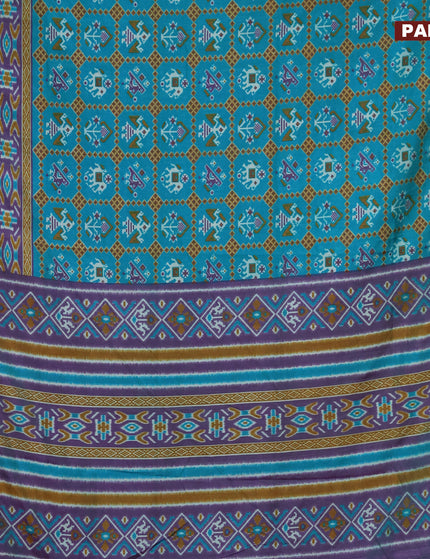 Semi tussar saree teal blue and dual shade of purple with allover ikat prints and zari woven border