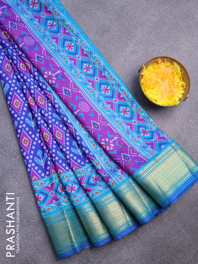 Semi tussar saree blue and cs blue with allover ikat prints and zari woven border