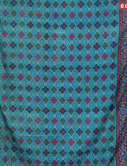 Semi tussar saree teal blue and dual shade of bluish purple with allover prints and zari woven border