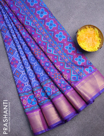 Semi tussar saree blue and purple with allover prints and zari woven border