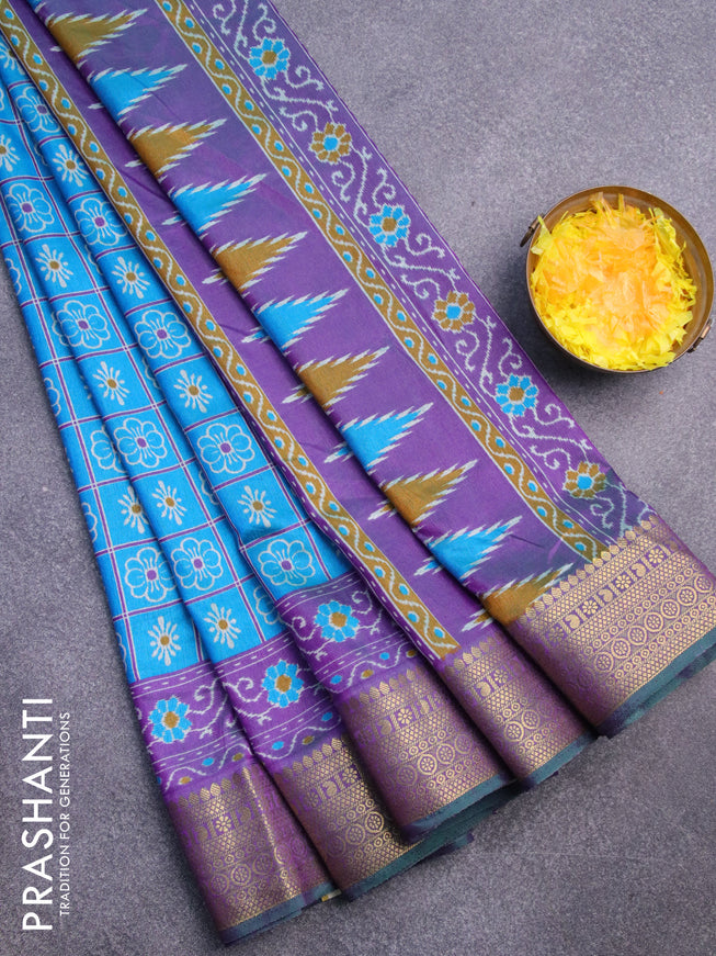 Semi tussar saree cs blue and purple with allover prints and zari woven border