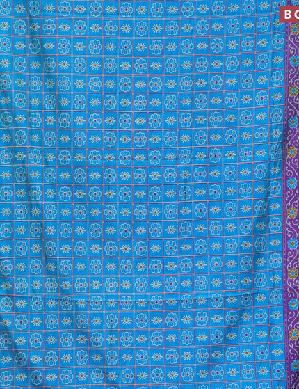 Semi tussar saree cs blue and purple with allover prints and zari woven border