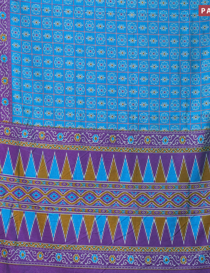 Semi tussar saree cs blue and purple with allover prints and zari woven border