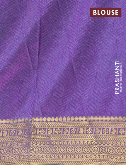 Semi tussar saree cs blue and purple with allover prints and zari woven border