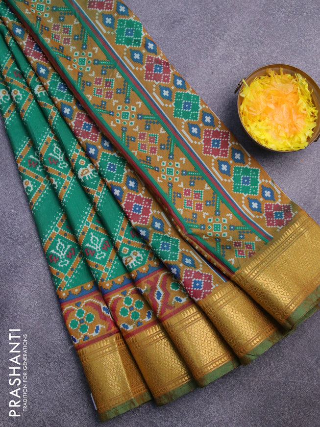 Semi tussar saree green and dark mustard with allover ikat prints and zari woven border