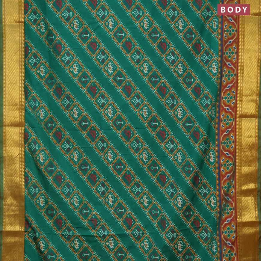 Semi tussar saree green and dark mustard with allover ikat prints and zari woven border