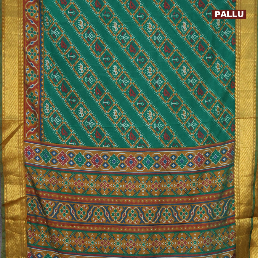 Semi tussar saree green and dark mustard with allover ikat prints and zari woven border