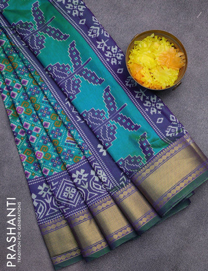 Semi tussar saree dual shade of cs blue and dual shade of bluish green with allover ikat prints and zari woven border