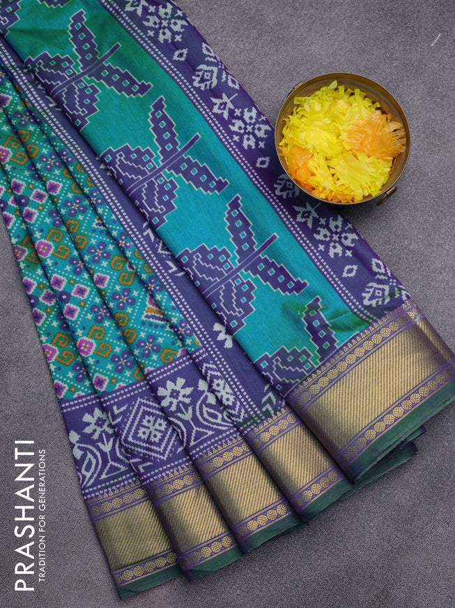 Semi tussar saree dual shade of cs blue and dual shade of bluish green with allover ikat prints and zari woven border