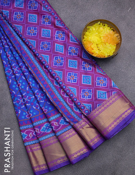 Semi tussar saree blue and purple with allover prints and zari woven border