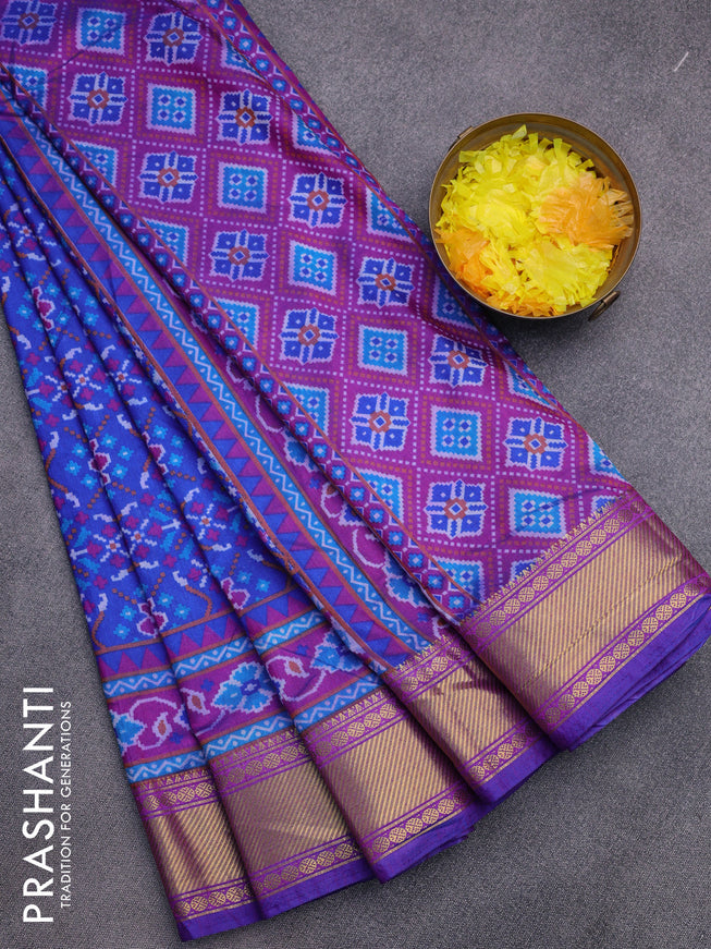 Semi tussar saree blue and purple with allover prints and zari woven border