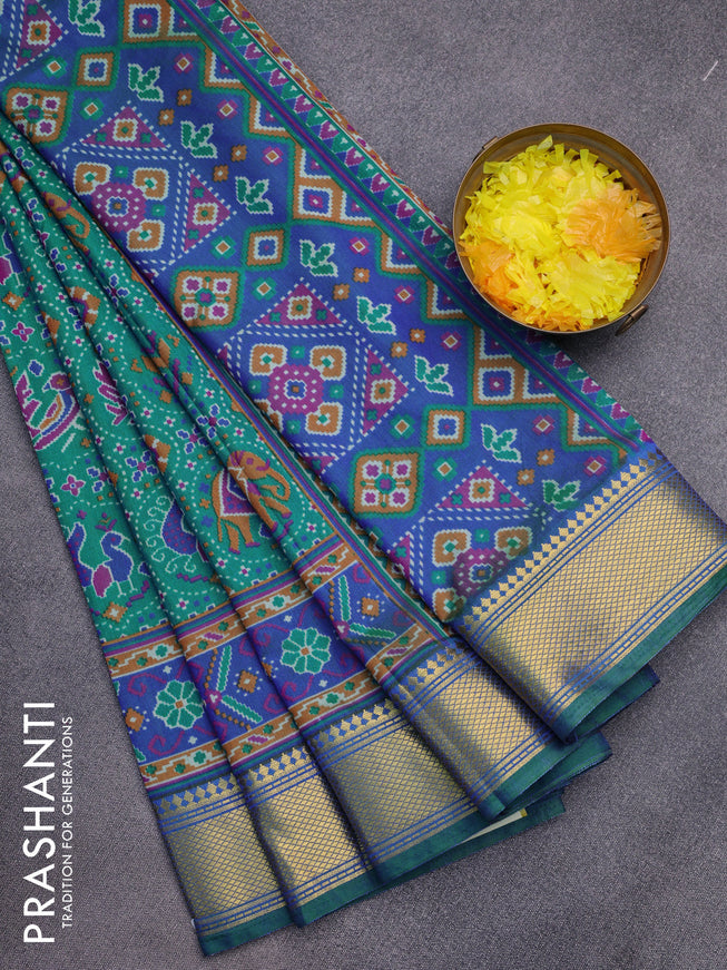 Semi tussar saree teal blue and blue with allover prints and zari woven border