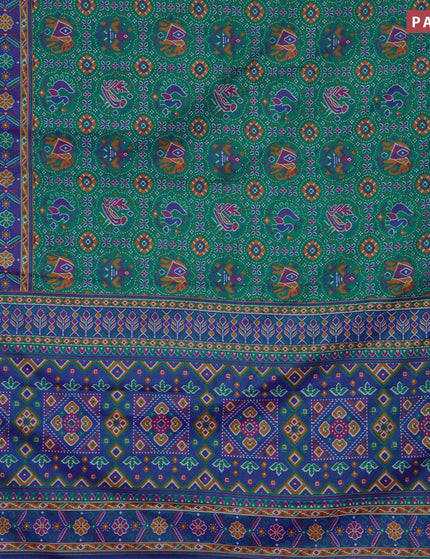 Semi tussar saree teal blue and blue with allover prints and zari woven border