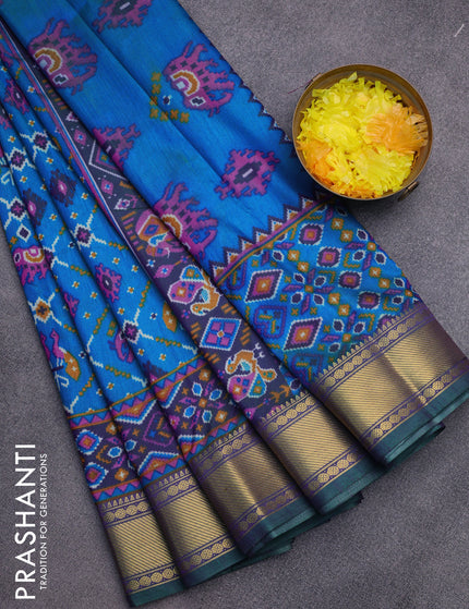 Semi tussar saree dual shade of teal blue and dual shade of violet with allover ikat prints and zari woven border