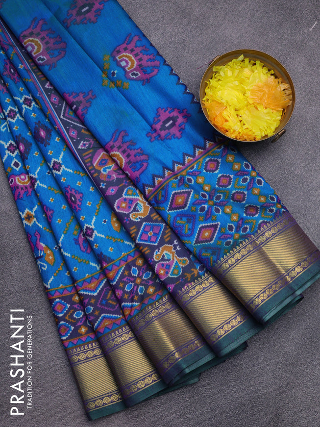 Semi tussar saree dual shade of teal blue and dual shade of violet with allover ikat prints and zari woven border