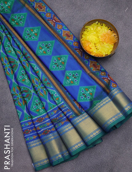 Semi tussar saree green and blue with allover prints and zari woven border