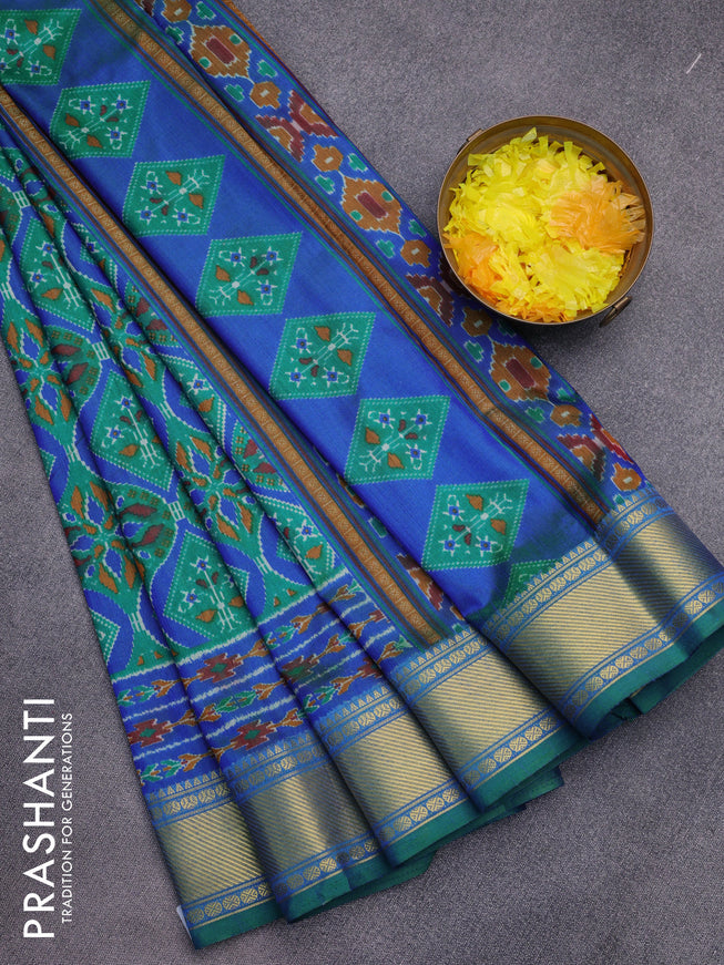 Semi tussar saree green and blue with allover prints and zari woven border