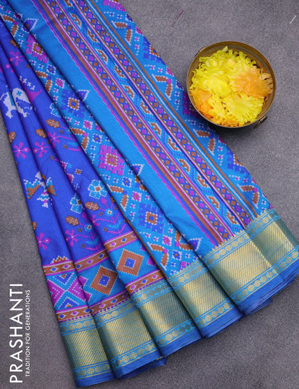 Semi tussar saree blue and cs blue with ikat butta prints and zari woven border