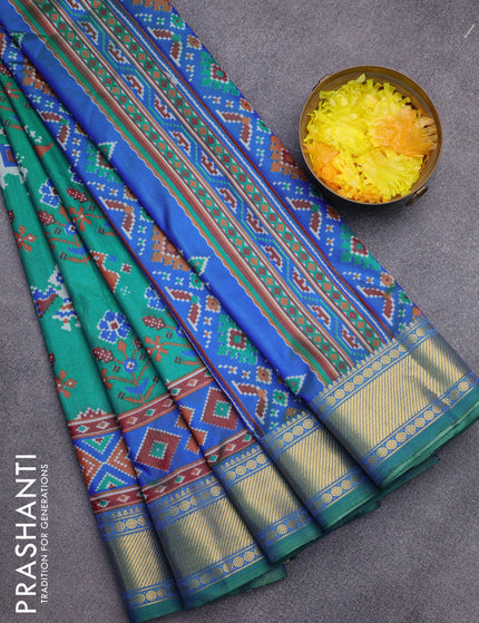 Semi tussar saree teal green and blue with ikat butta prints and zari woven border