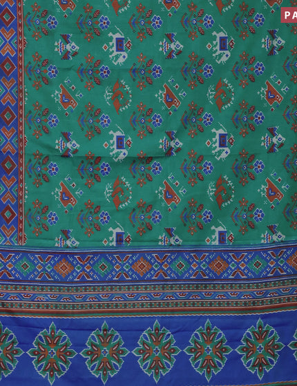 Semi tussar saree teal green and blue with ikat butta prints and zari woven border