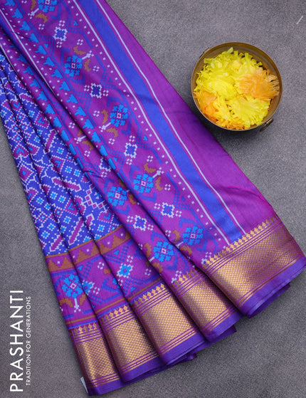 Semi tussar saree blue and purple with allover ikat prints and zari woven border