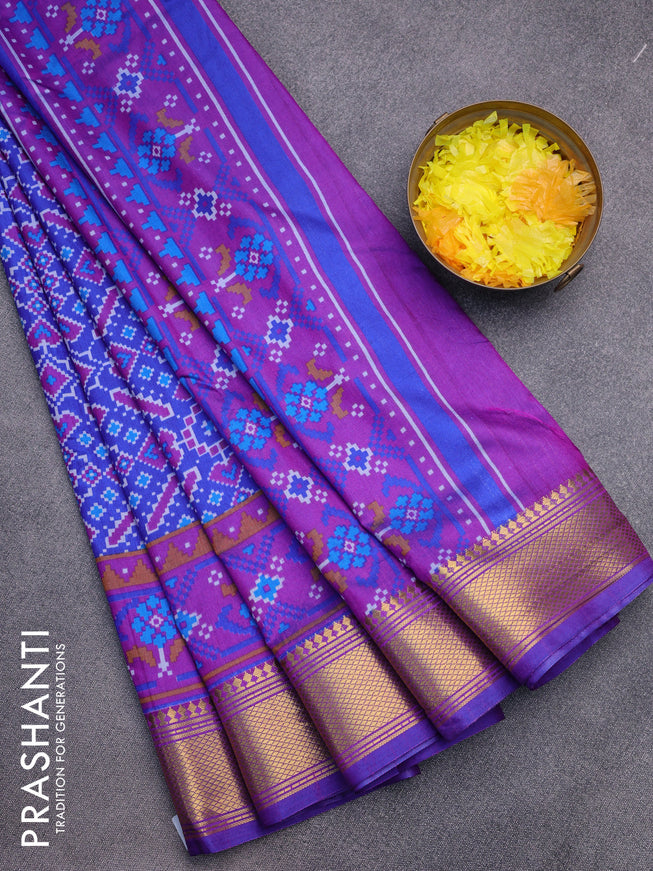 Semi tussar saree blue and purple with allover ikat prints and zari woven border