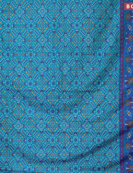 Semi tussar saree teal green and dual shade of blue with allover ikat prints and zari woven border