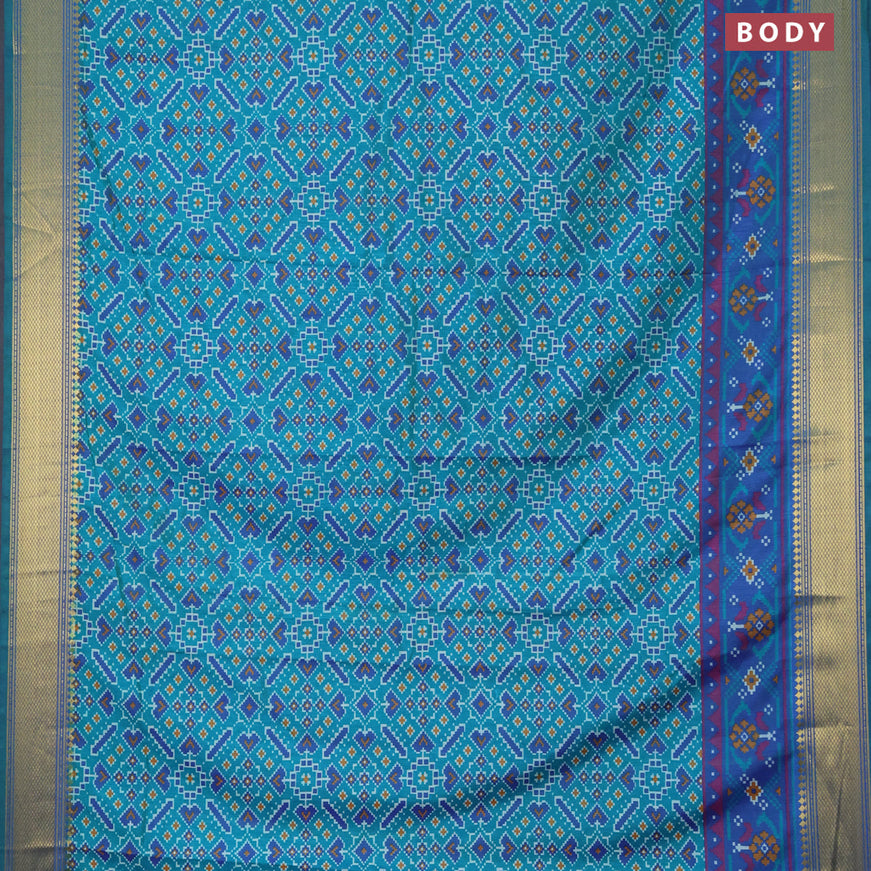 Semi tussar saree teal green and dual shade of blue with allover ikat prints and zari woven border