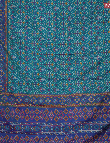 Semi tussar saree teal green and blue with allover ikat prints and zari woven border