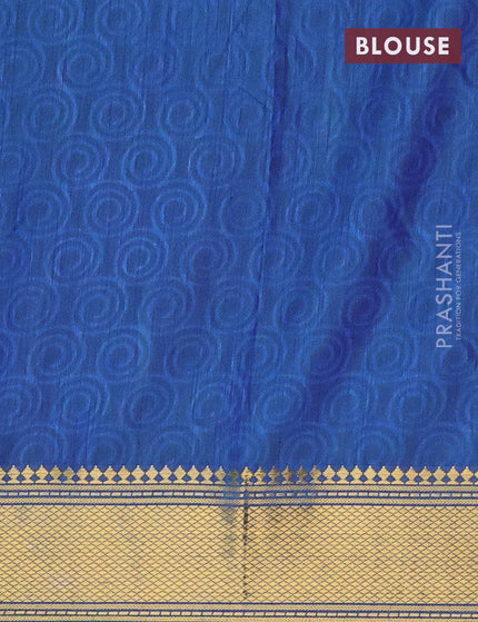 Semi tussar saree teal green and blue with allover ikat prints and zari woven border