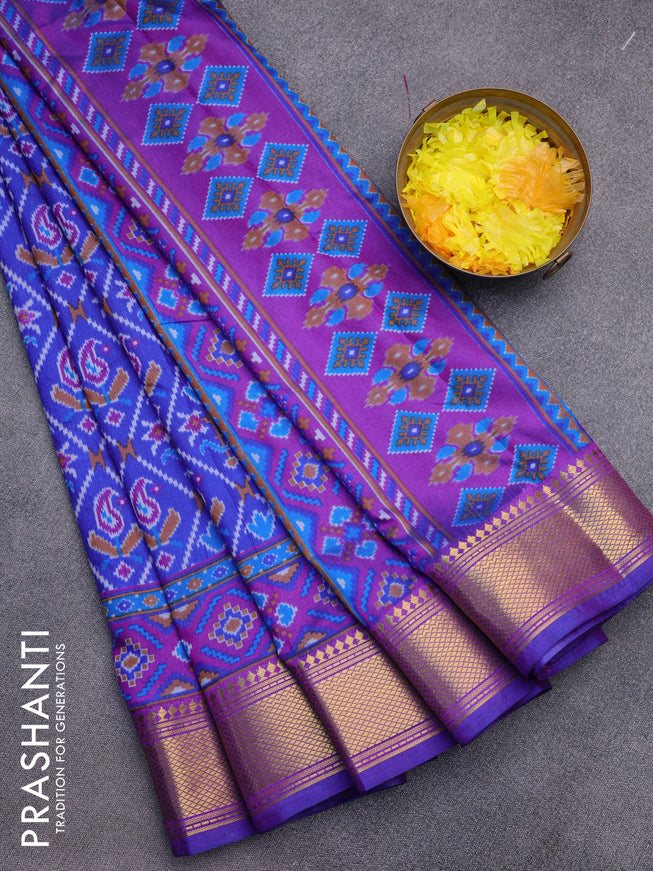 Semi tussar saree blue and purple with allover ikat prints and zari woven border