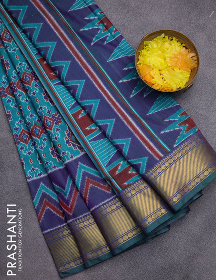 Semi tussar saree teal green and dual shade of blue with allover ikat prints and zari woven border