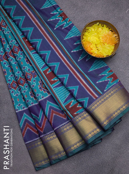 Semi tussar saree teal green and dual shade of blue with allover ikat prints and zari woven border