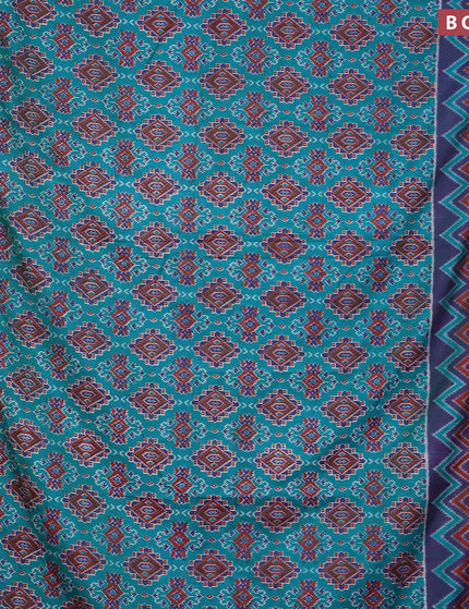 Semi tussar saree teal green and dual shade of blue with allover ikat prints and zari woven border