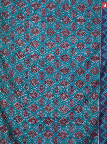 Semi tussar saree teal green and dual shade of blue with allover ikat prints and zari woven border